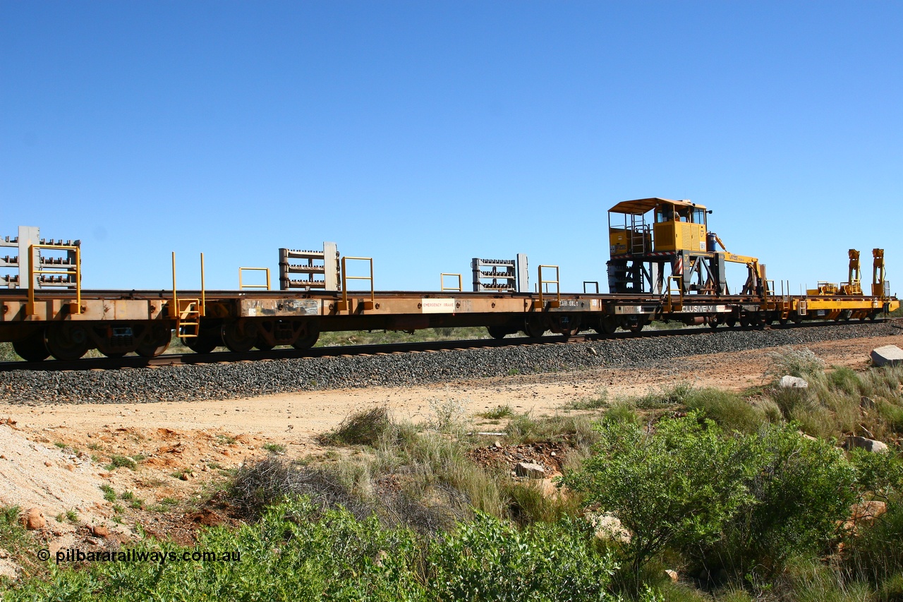 080621 2720
Tabba South, one of a batch of six flat waggons converted by Mt Newman Mining workshops by cutting down a pair of ore waggons to make one flat waggon, 6105 in service with the rail recovery and transport train as waggon #2.
Keywords: Mt-Newman-Mining-WS;Magor-USA;BHP-rail-train;