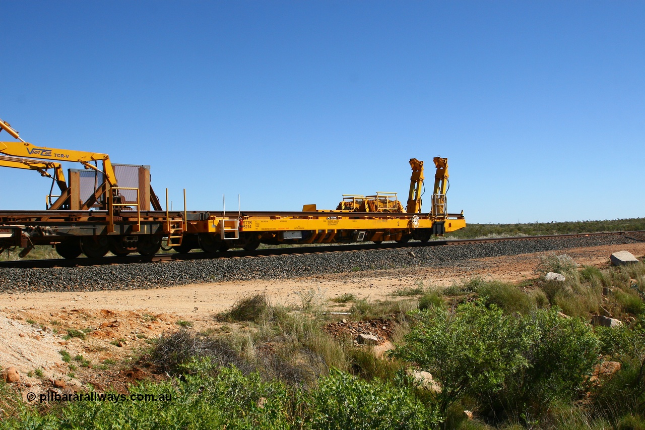 080621 2722
Tabba South, new Lead-Off Lead-On waggon STTR class STTR 6214 on the end of the Steel Train or rail recovery and transport train, built by Gemco Rail WA, the chutes can be seen standing up with the squeeze rollers behind the mesh.
Keywords: Gemco-Rail-WA;BHP-rail-train;STTR-type;STTR6214;