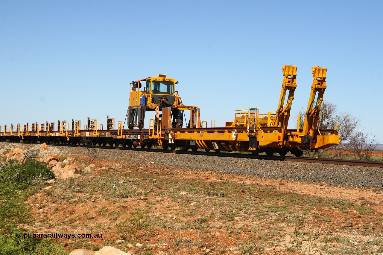 080621 2724
Tabba South, view from rear of new Lead-Off Lead-On waggon STTR class STTR 6214 on the end of the Steel Train or rail recovery and transport train, built by Gemco Rail WA, the chutes can be seen standing up with the squeeze rollers behind the mesh.
Keywords: Gemco-Rail-WA;BHP-rail-train;STTR-type;STTR6214;