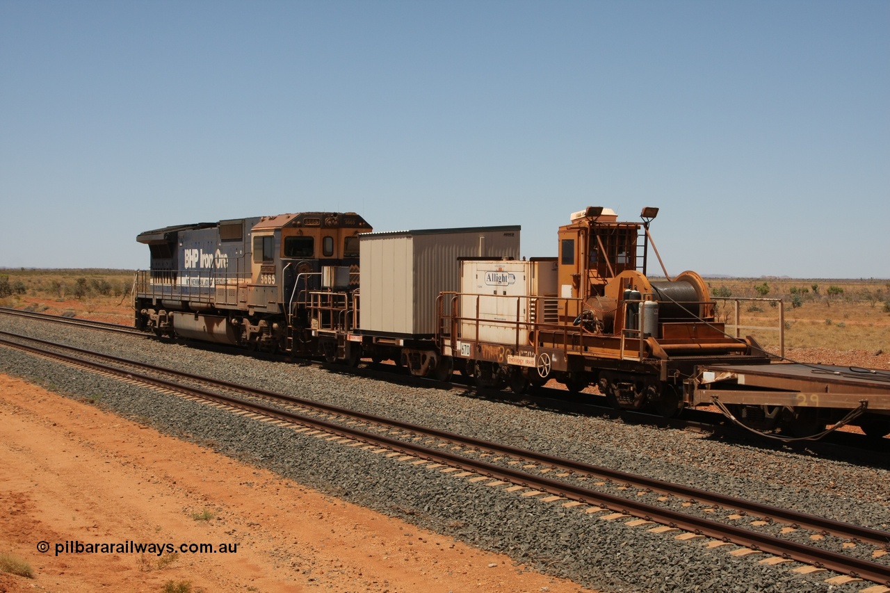 081217 0451
Woodstock Siding, rail recovery and transport train flat waggon #30, 6702, heavily cut down and modified Magor USA ore waggon by Mt Newman Mining workshops, converted to a 50 tonne flat waggon and designated the winch waggon with generator set to power the winch and the crib car.
Keywords: Magor-USA;Mt-Newman-Mining-WS;BHP-rail-train;