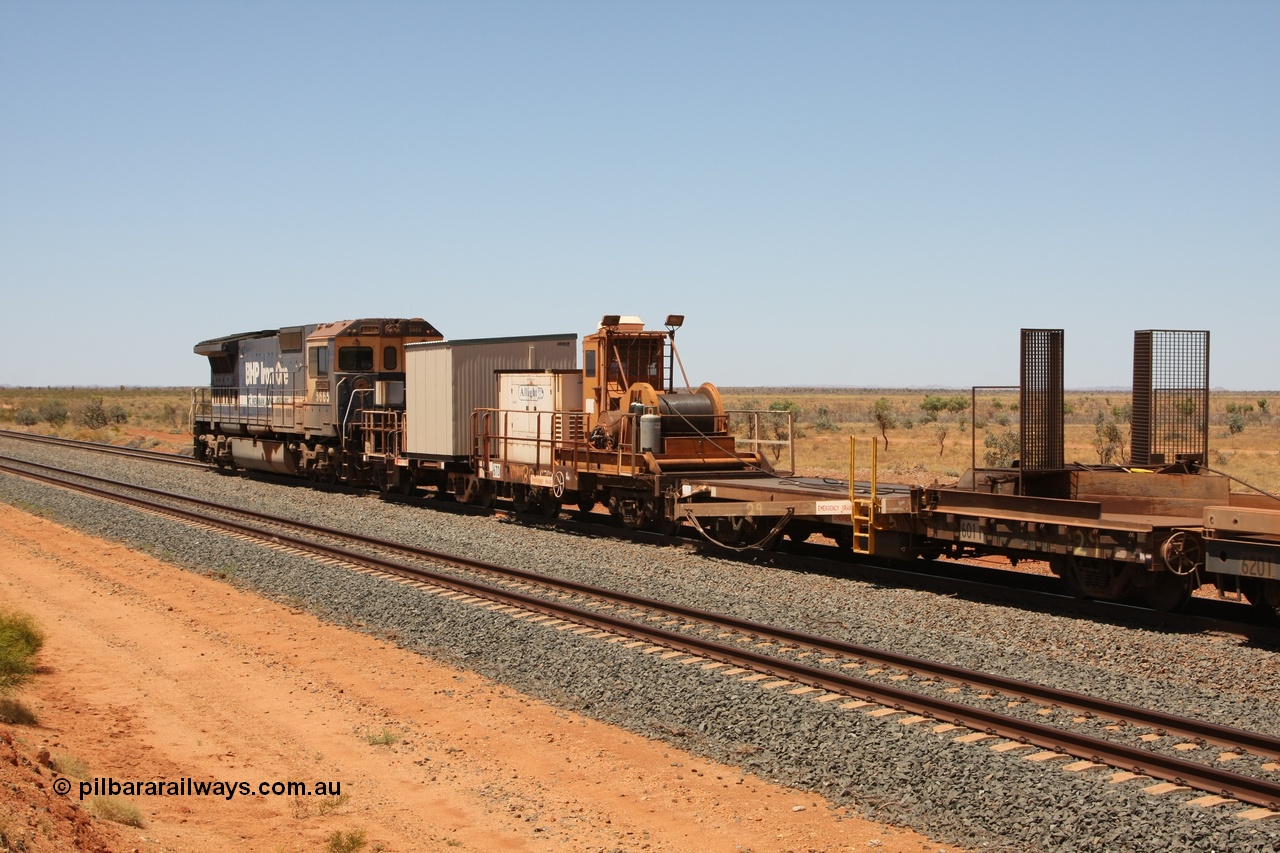 081217 0452
Woodstock Siding, rail recovery and transport train, waggon #29, 1st lead off waggon 6011, built by Scotts of Ipswich Qld on 04-09-1970, the mesh guarding is for the winch cable. The chute arrangement for the discharging and recovery of rail is visible.
Keywords: BHP-rail-train;Scotts-Qld;