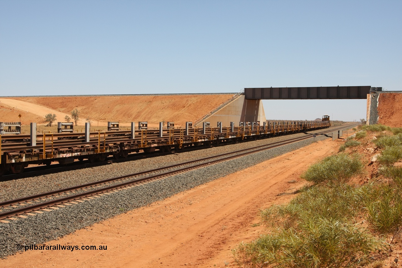 081217 0453
Woodstock Siding, looking north with the FMG overbridge as the rail recovery and transport train travels south on the mainline.
Keywords: BHP-rail-train;