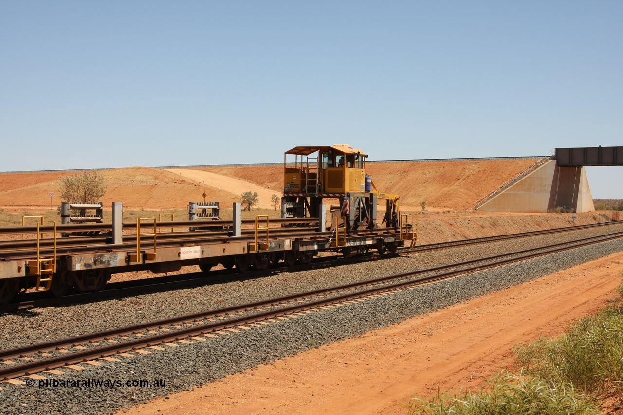 081217 0454
Woodstock Siding, one of a batch of six flat waggons converted by Mt Newman Mining workshops by cutting down a pair of ore waggons to make one flat waggon, 6105 in service with the rail recovery and transport train as waggon #2.
Keywords: Mt-Newman-Mining-WS;BHP-rail-train;