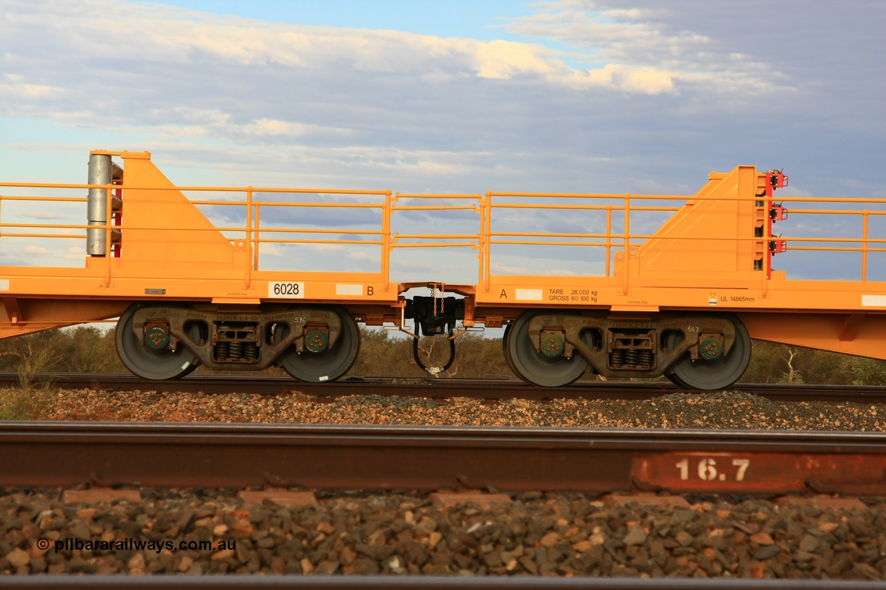 100717 0659
Flash Butt yard, new rail stock carrier waggon 6028, built by Gemco Rail in late 2009-10 with Barber bogies.
Keywords: Gemco-Rail-WA;BHP-rail-train;