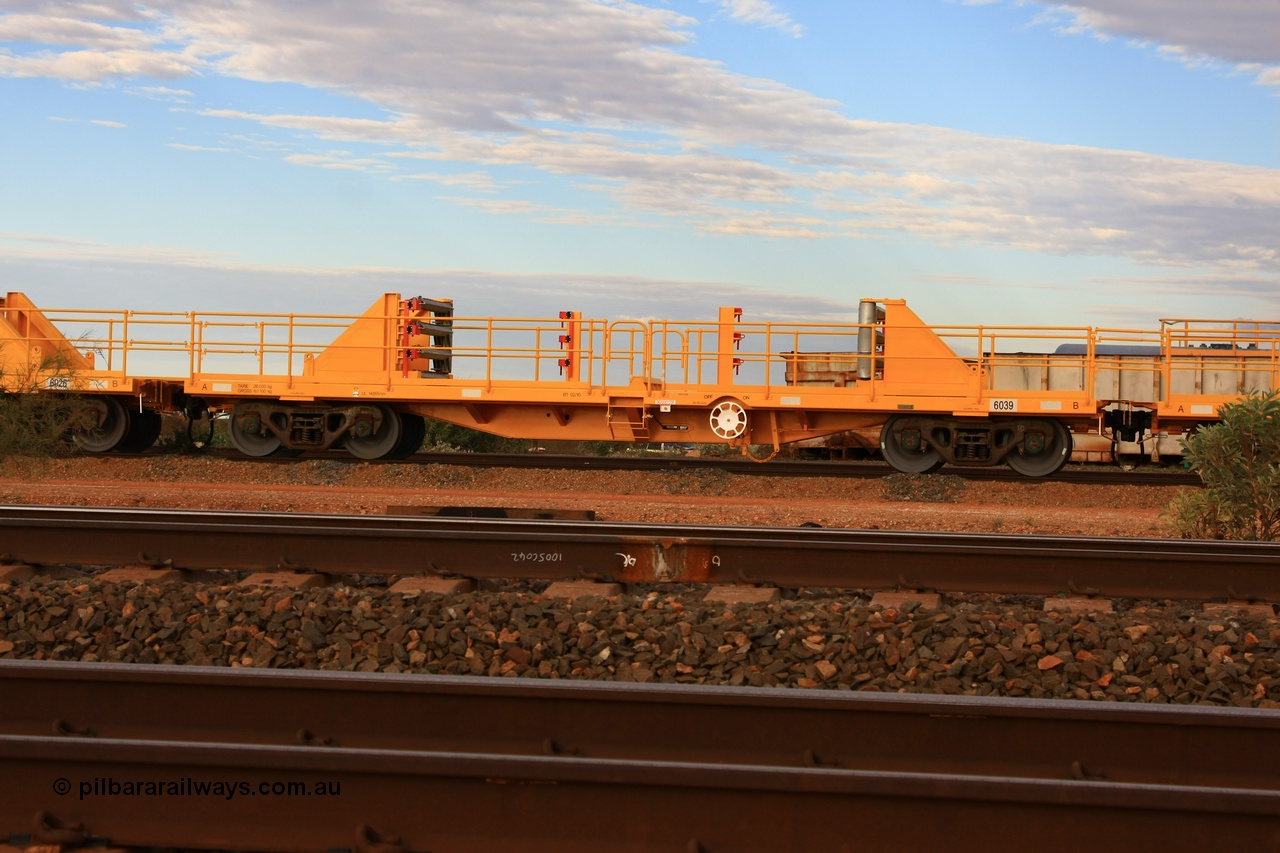 100717 0667
Flash Butt yard, new rail stock carrier waggon 6039, built by Gemco Rail in late 2009-10 with Barber bogies.
Keywords: Gemco-Rail-WA;BHP-rail-train;