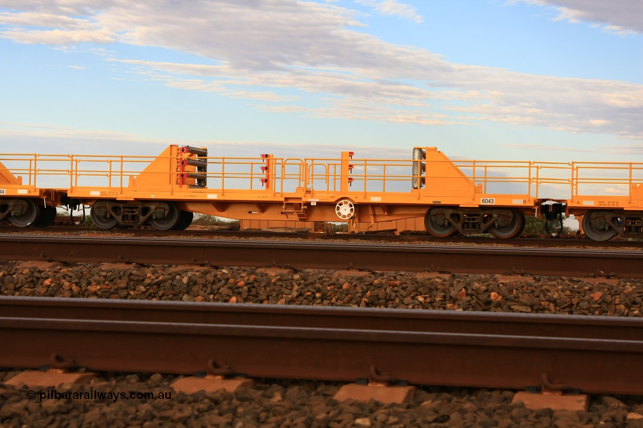 100717 0675
Flash Butt yard, new rail stock carrier waggon 6043, built by Gemco Rail in late 2009-10 with Barber bogies.
Keywords: Gemco-Rail-WA;BHP-rail-train;