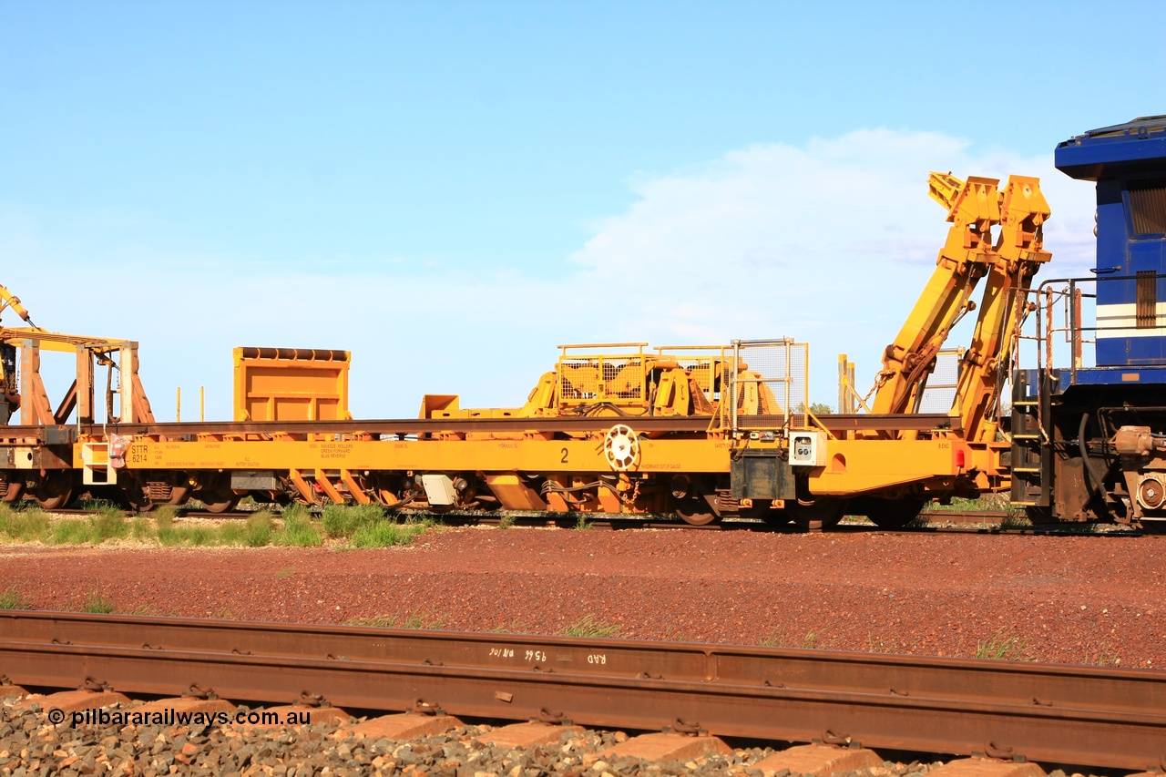 110208 9425
Flash Butt yard, new Lead-Off Lead-On waggon STTR class STTR 6214 on the end of the Steel Train or rail recovery and transport train, built by Gemco Rail WA, the chutes can be seen standing up with the squeeze rollers behind the mesh.
Keywords: Gemco-Rail-WA;BHP-rail-train;STTR-type;STTR6214;
