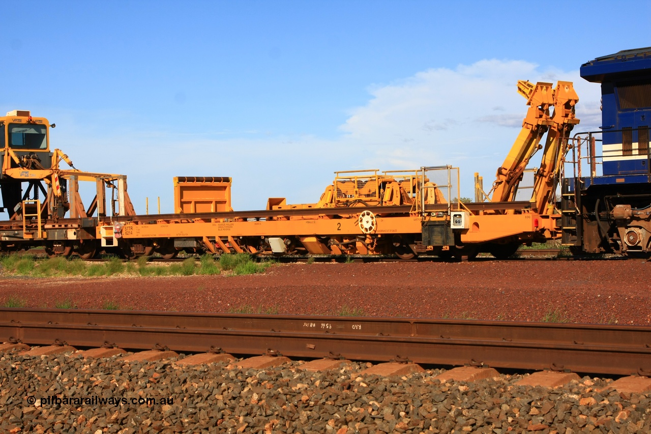 110208 9429
Flash Butt yard, new Lead-Off Lead-On waggon STTR class STTR 6214 on the end of the Steel Train or rail recovery and transport train, built by Gemco Rail WA, the chutes can be seen standing up with the squeeze rollers behind the mesh.
Keywords: Gemco-Rail-WA;BHP-rail-train;STTR-type;STTR6214;