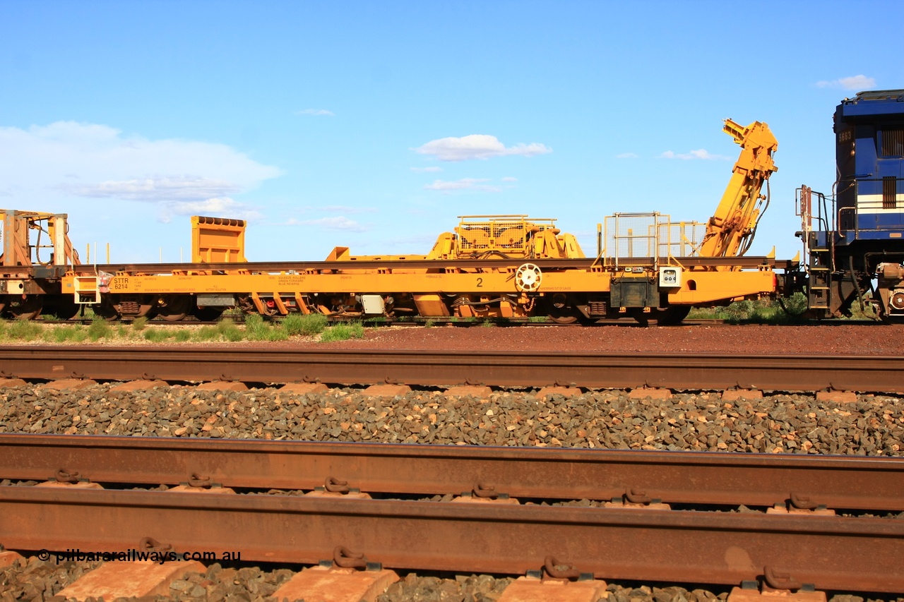110208 9430
Flash Butt yard, new Lead-Off Lead-On waggon STTR class STTR 6214 on the end of the Steel Train or rail recovery and transport train, built by Gemco Rail WA, the chutes can be seen standing up with the squeeze rollers behind the mesh.
Keywords: Gemco-Rail-WA;BHP-rail-train;STTR-type;STTR6214;