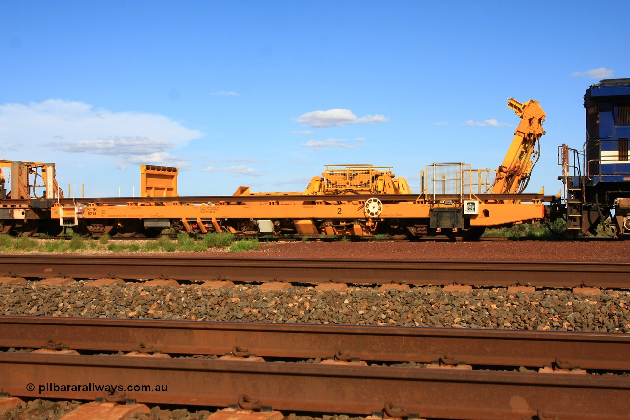 110208 9431
Flash Butt yard, new Lead-Off Lead-On waggon STTR class STTR 6214 on the end of the Steel Train or rail recovery and transport train, built by Gemco Rail WA, the chutes can be seen standing up with the squeeze rollers behind the mesh.
Keywords: Gemco-Rail-WA;BHP-rail-train;STTR-type;STTR6214;