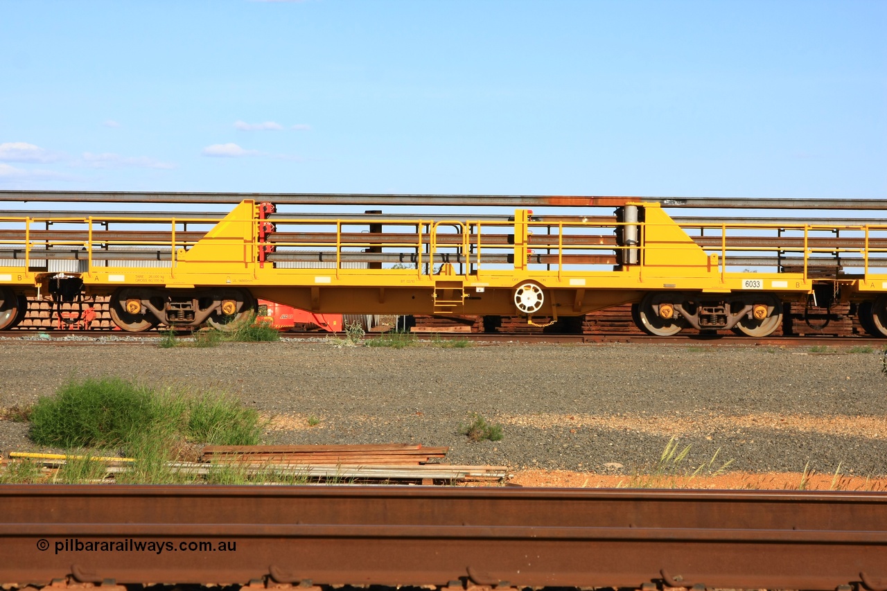 110208 9441
Flash Butt yard, new rail stock carrier waggon 6033 loaded with strings of rail, built by Gemco Rail in late 2009-10 with Barber bogies.
Keywords: BHP-rail-train;Gemco-Rail-WA;
