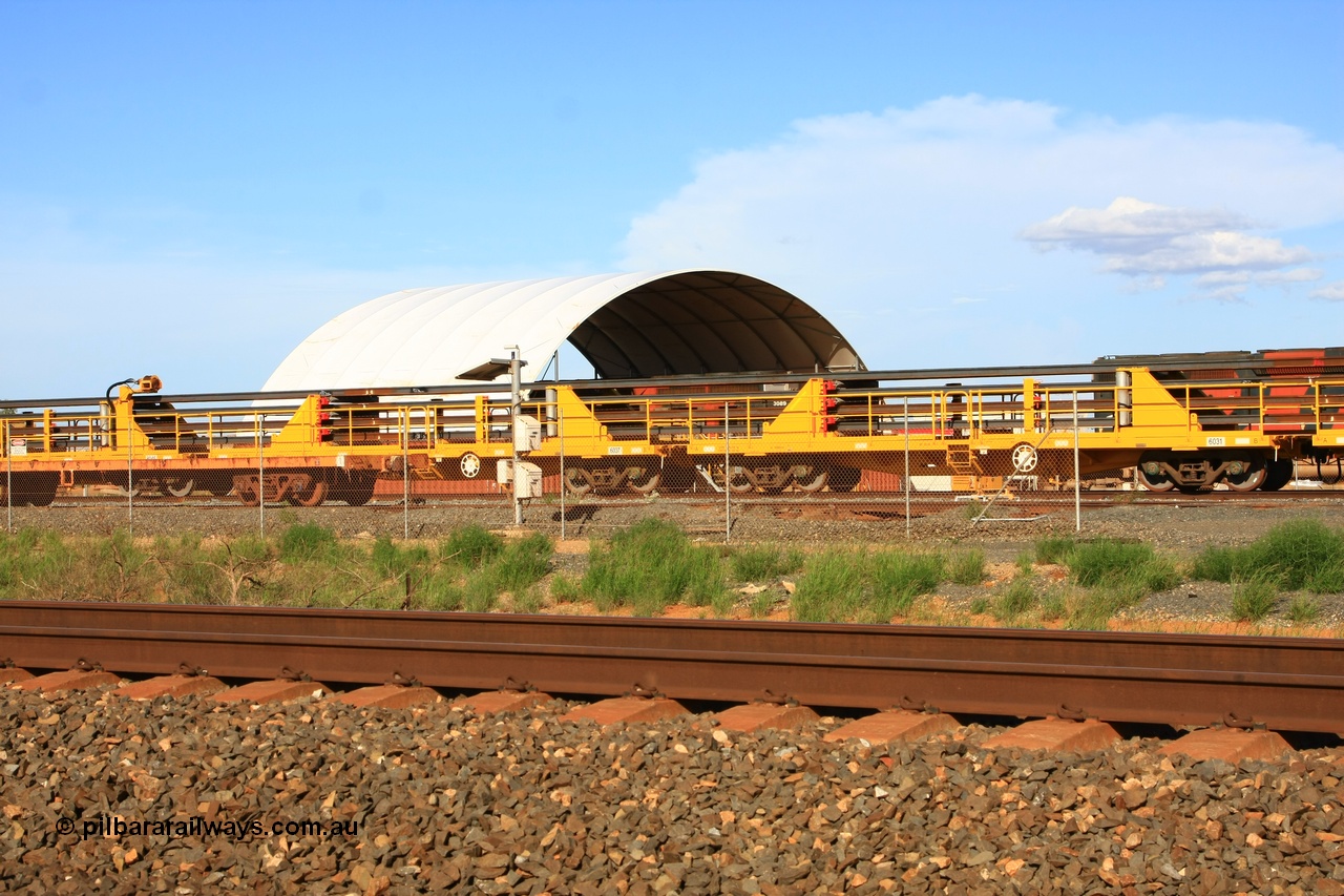 110208 9443
Flash Butt yard, new rail stock carrier waggon 6031 loaded with strings of rail, built by Gemco Rail in late 2009-10 with Barber bogies.
Keywords: BHP-rail-train;Gemco-Rail-WA;