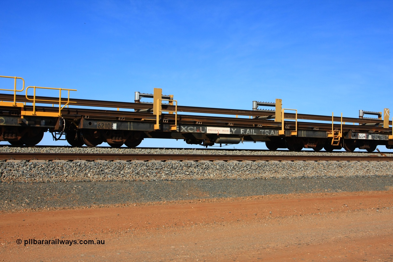 110619 1881
South of Mooka Siding, the Steel Train or rail recovery and transport train, flat waggon #11, 6210, a Comeng WA built flat waggon from January 1977 under order no. 07-M-282 RY.
Keywords: Comeng-WA;BHP-rail-train;