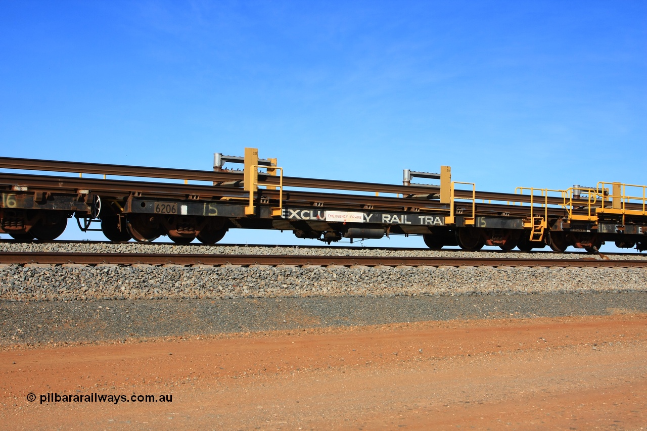 110619 1885
South of Mooka Siding, the Steel Train or rail recovery and transport train, flat waggon #15, 6206, a Comeng WA built flat waggon from January 1977 under order no. 07-M-282 RY.
Keywords: BHP-rail-train;Comeng-WA;