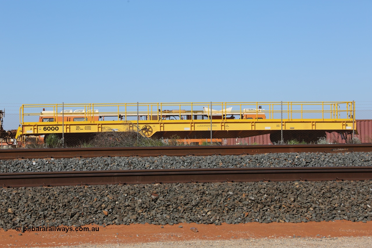 130720 1461
Flash Butt yard, new heavyweight out of gauge flat waggon 6000, unsure of builder, could be Gemco Rail in Perth.
Keywords: BHP-flat-waggon;