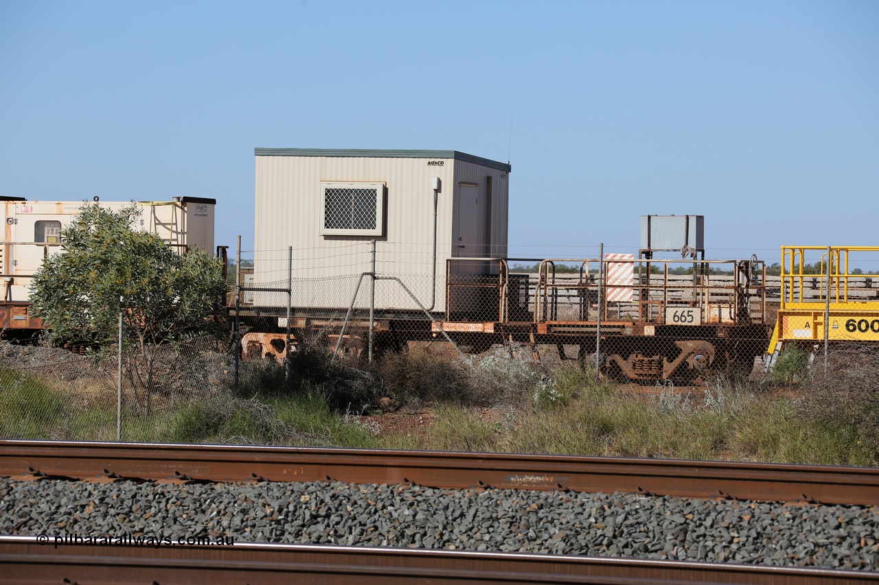 130720 1557
Flash Butt yard, out of service crib waggon a cut down Magor USA built Oroville ore waggon, seen here with a new Ausco donga replacing the original ATCO unit.
Keywords: Magor-USA;Mt-Newman-Mining-WS;BHP-rail-train;