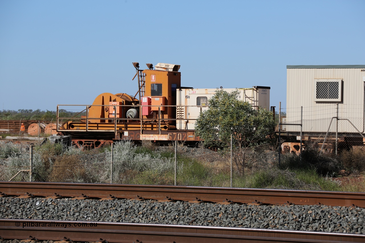 130720 1558
Flash Butt yard, rail recovery and transport train, flat waggon 6702, heavily cut down and modified Magor USA ore waggon by Mt Newman Mining workshops, converted to a 50 tonne waggon and designated the winch waggon with generator set to power the winch and the crib car.
Keywords: Magor-USA;Mt-Newman-Mining-WS;BHP-rail-train;