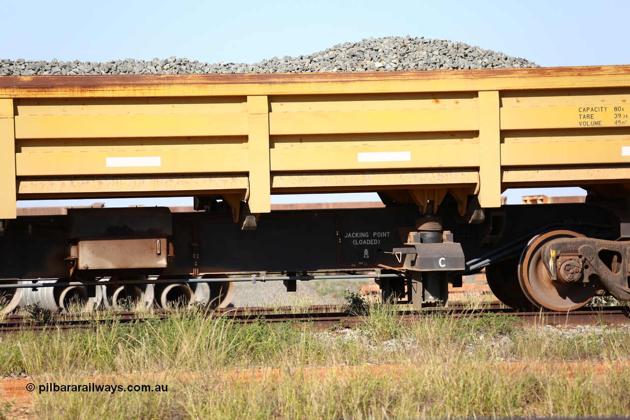 150619 9081
Flash Butt yard, CNR-QRRS of China built side dump waggons, built and delivered around 2011-12, waggon 0710 loaded with fines for sheeting, mid-section detail.
Keywords: CNR-QRRS-China;BHP-ballast-waggon;