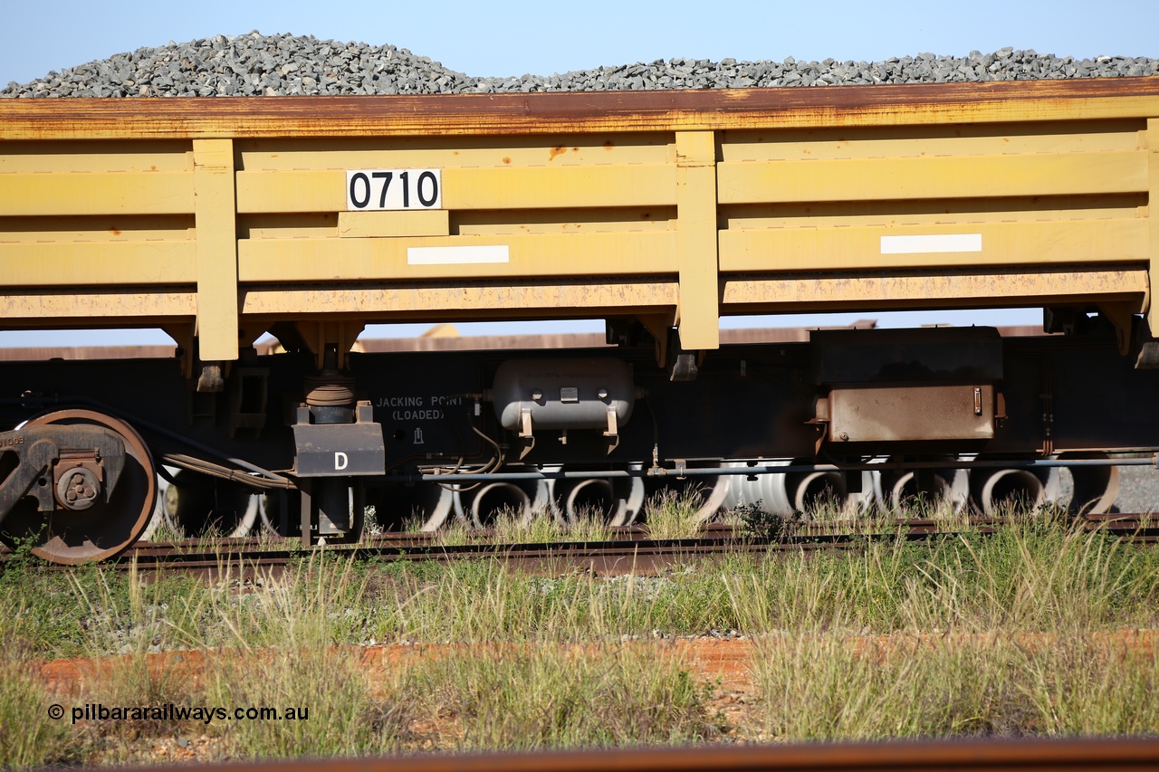 150619 9082
Flash Butt yard, CNR-QRRS of China built side dump waggons, built and delivered around 2011-12, waggon 0710 loaded with fines for sheeting, mid-section detail.
Keywords: CNR-QRRS-China;BHP-ballast-waggon;