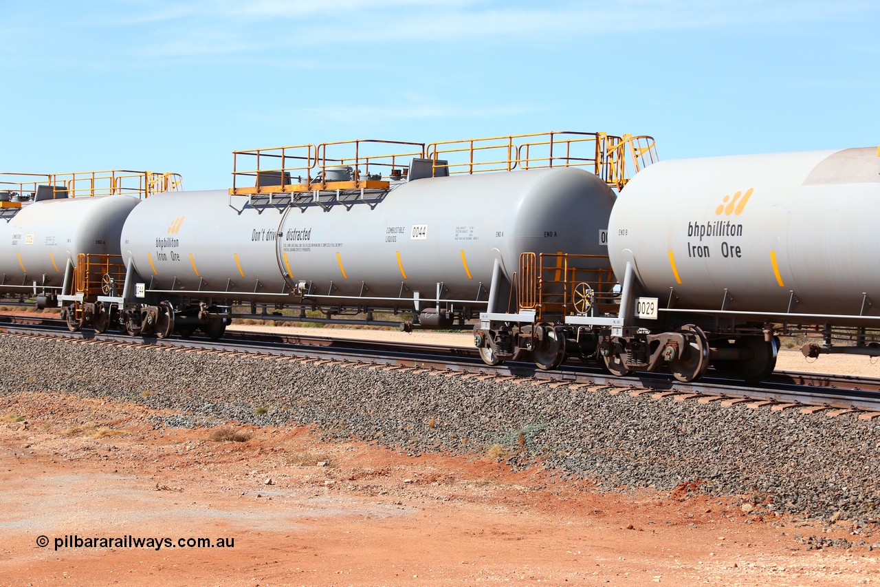 160128 00331
Mooka Siding, empty 116 kL CNR-QRRS of China built tank waggon 0044, one of a second batch delivered in 2015 with safety slogan 'Don't drive distracted'.
Keywords: CNR-QRRS-China;BHP-tank-waggon;