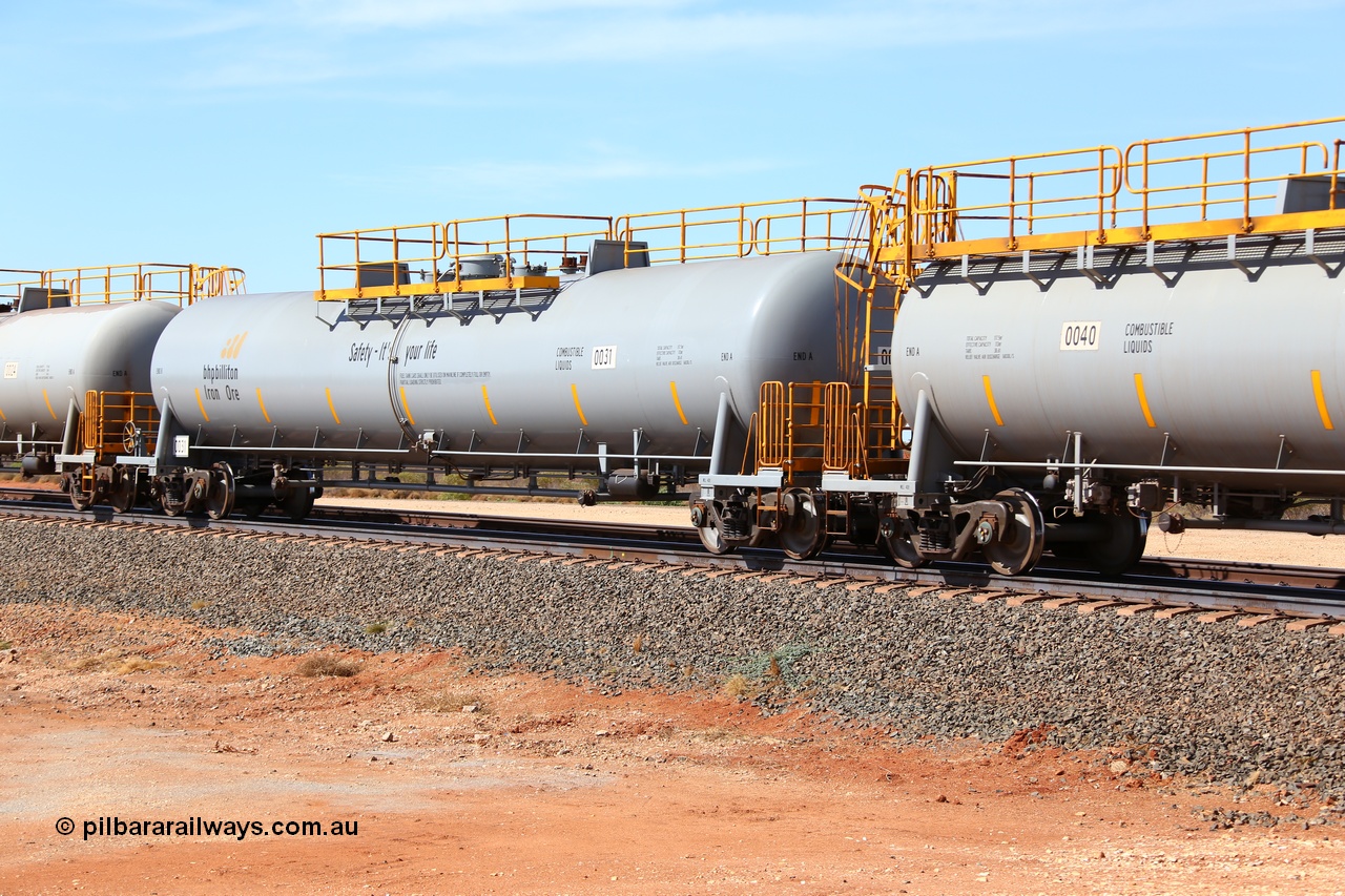 160128 00339
Mooka Siding, empty 116 kL CNR-QRRS of China built tank waggon 0031, class leader of a second batch delivered in 2015 with safety slogan 'Safety - It's your life'.
Keywords: CNR-QRRS-China;BHP-tank-waggon;