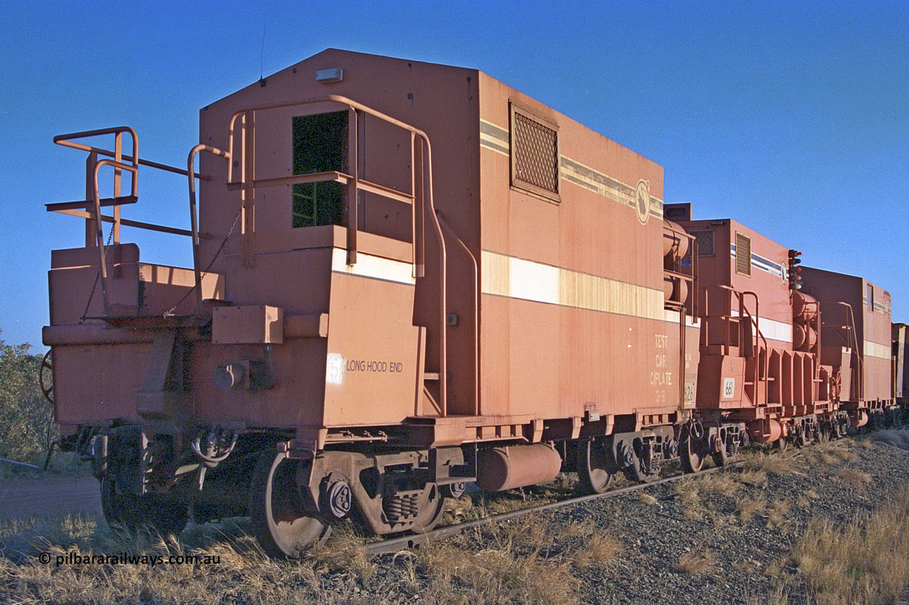 2626 Mt Newman Mining Workshops 257-15
Flash Butt yard, rear view of stored out of service LocoTrol waggons, 2626 closest to camera, then 661 and 2065. 2626 and 2065 converted from Comeng WA build ore waggons, 661 modified from a Magor USA Oroville build.
Keywords: Magor-USA;BHP-Locotrol-waggon;