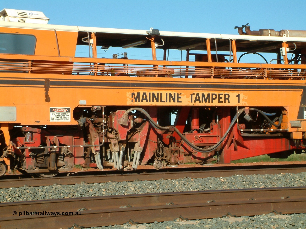 040408 162720
Mooka Siding north backtrack, view of the tamping mechanism of BHP's mainline Tamper 1, Plasser Australia 09-32 CAT model with serial 306. 8th April 2004.
Keywords: Tamper1;Plasser-Australia;09-32-CAT;306;track-machine;