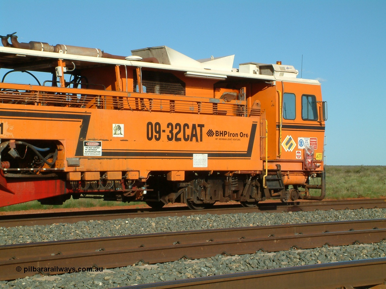 040408 162730
Mooka Siding north backtrack, view of the driving cab end of BHP's mainline Tamper 1, Plasser Australia 09-32 CAT model with serial 306. 8th April 2004.
Keywords: Tamper1;Plasser-Australia;09-32-CAT;306;track-machine;