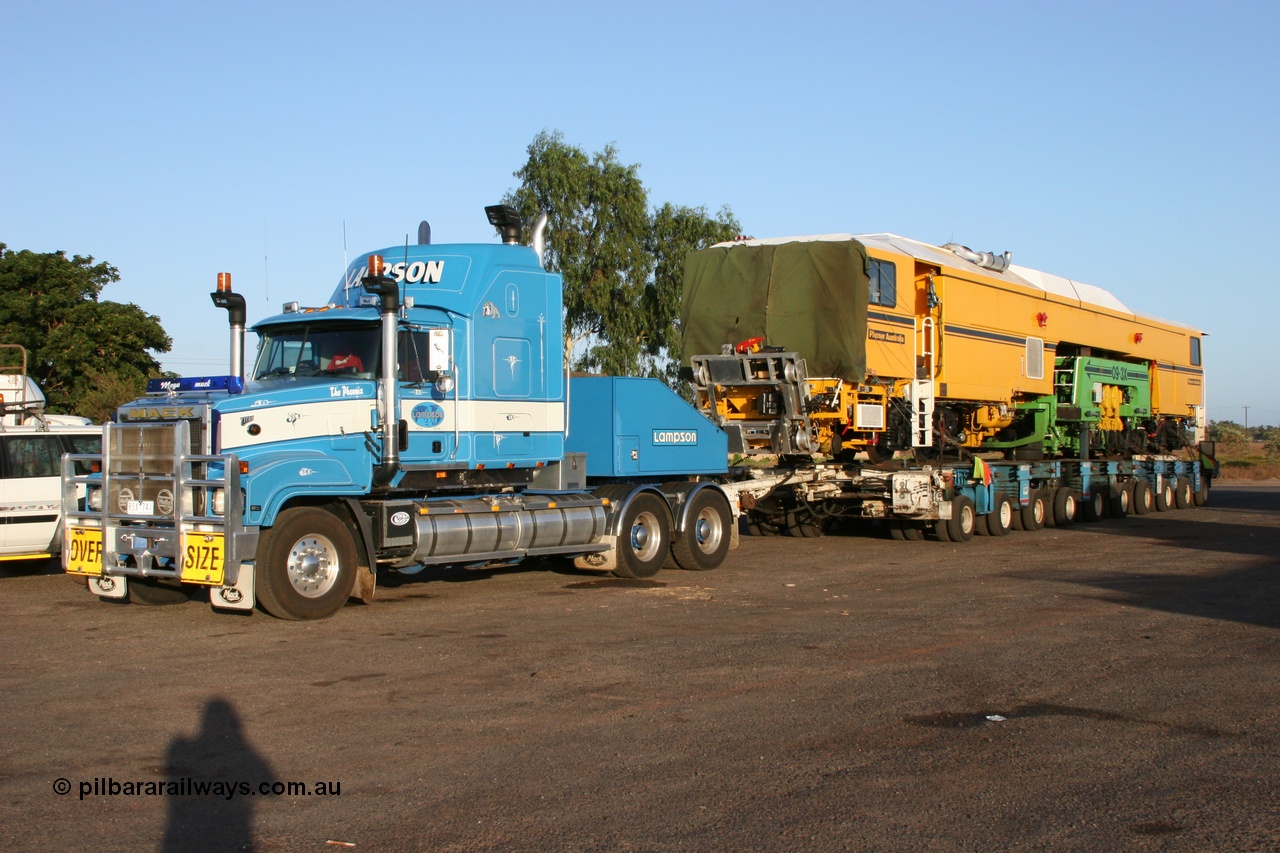 050409 0385
Shell Swagman Roadhouse, Lampson Mack Titan prime mover and eighty wheel float ready to deliver BHP's new mainline tamper a Plasser Australia 09-3X model with serial M480. 9th April 2005.
Keywords: Tamper3;Plasser-Australia;09-3X;M480;track-machine;