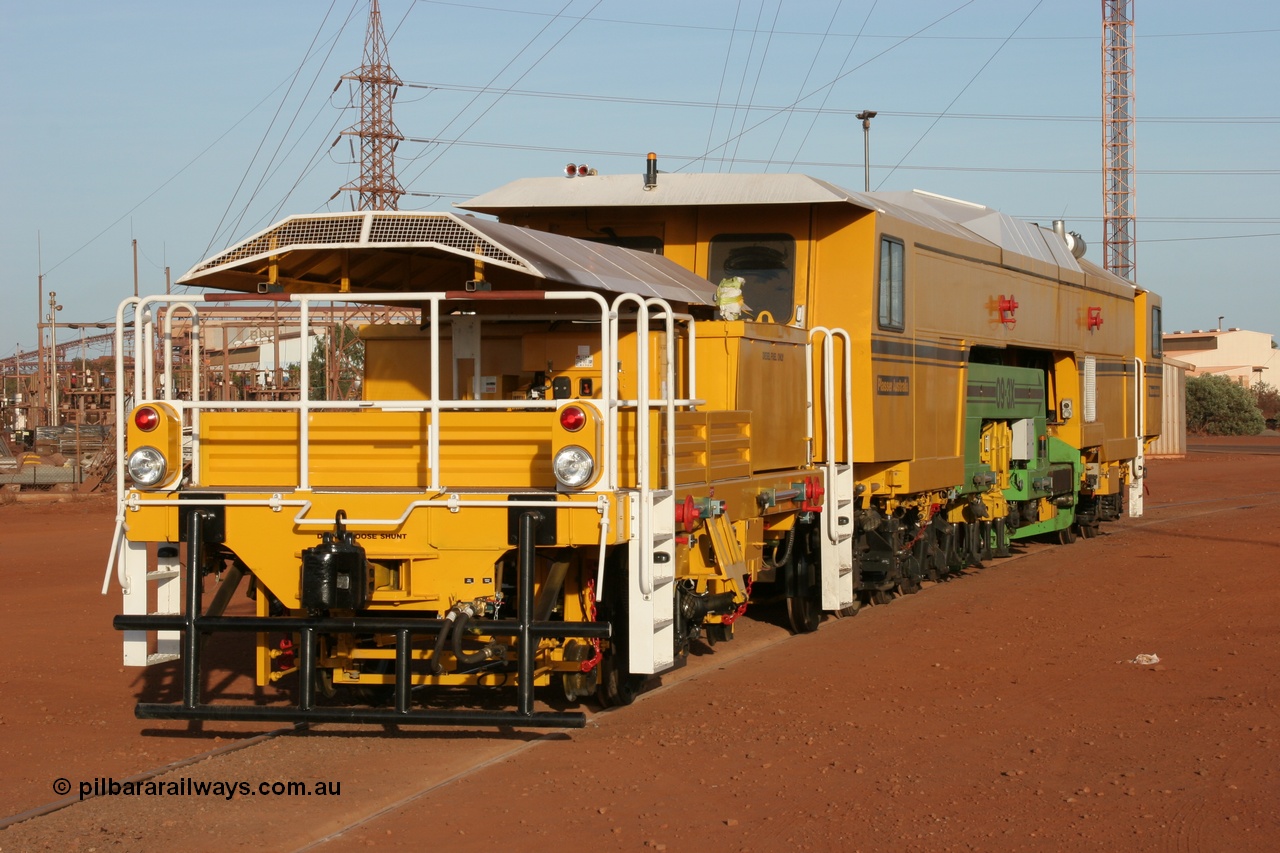 050410 0522
Nelson Point yard hard stand area rear view of brand new having only been delivered the day before, BHP track tamper to become Tamper 3, a Plasser Australia 09-3X model with serial M480. 10th April 2005.
Keywords: Tamper3;Plasser-Australia;09-3X;M480;track-machine;