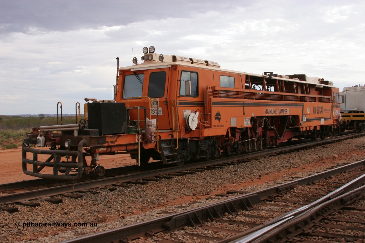 050412 0813
Abydos Siding backtrack, view of the rear of BHP's Mainline Tamper 1, a Plasser Australia 09-32 CAT model tamper serial 306 built in 1986. 12th April 2005.
Keywords: Tamper1;Plasser-Australia;09-32-CAT;306;track-machine;