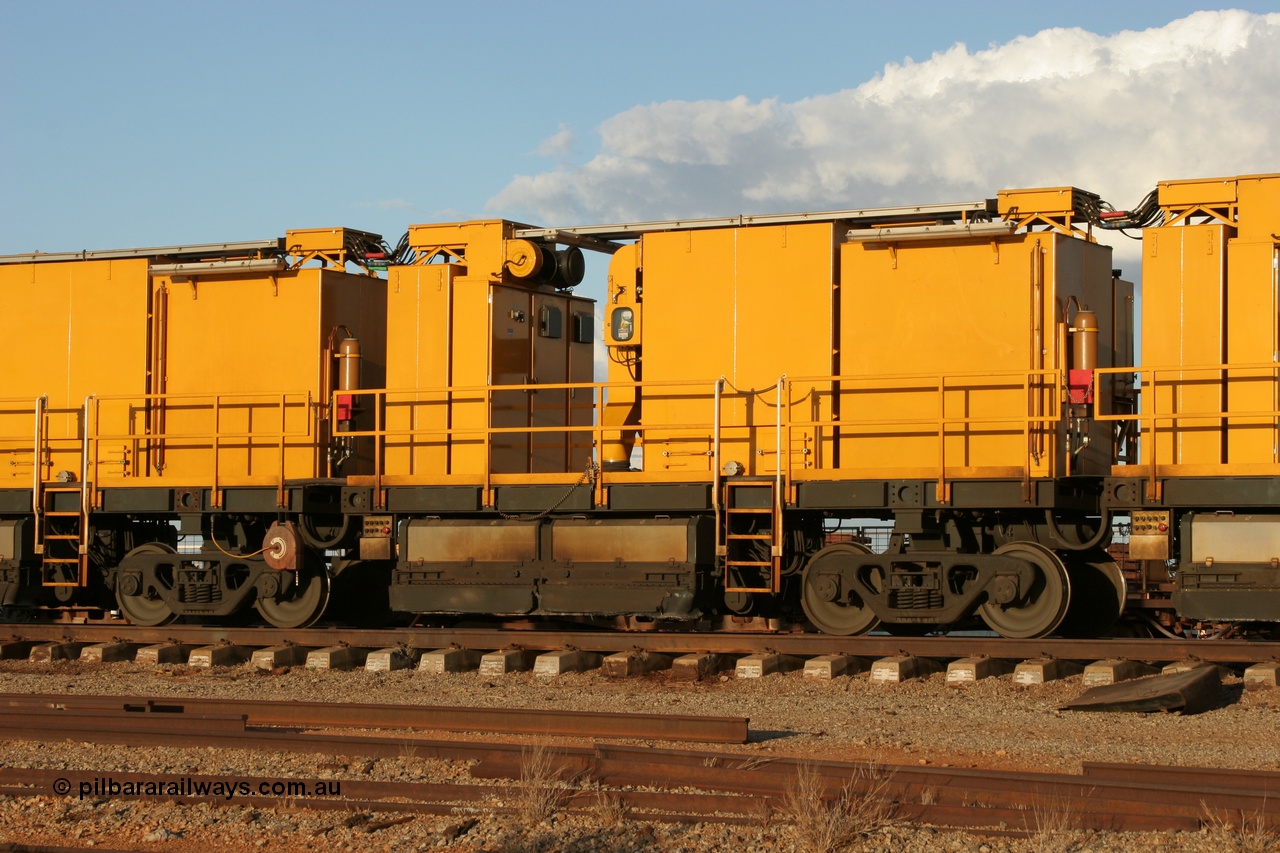 050414 0954
Flash Butt yard, Speno Australia's RR24 model 24 stone rail grinder serial M20 before it had id stickers fitted, this unit was later stickered as RG 1, view of the second grinding module coupled. 14th April 2005.
Keywords: Speno;RR24;M20;track-machine;