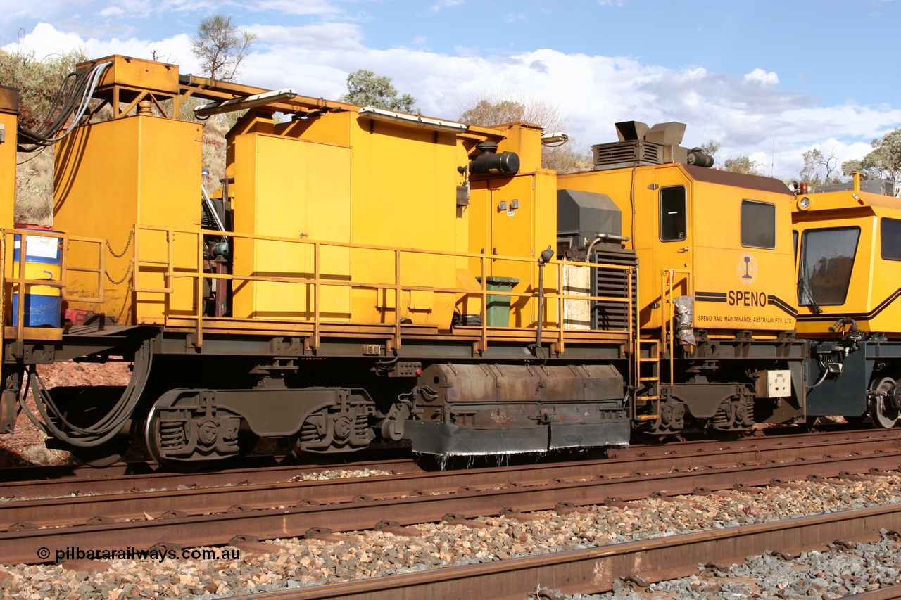 050421 1613
Hesta Siding backtrack, Speno Australia's 24 stone rail grinder before they had id stickers fitted, this front unit was later stickered as RG 2, rear view of the driving cab on the third grinding module. 21st April 2005.
Keywords: Speno;RR24;track-machine;