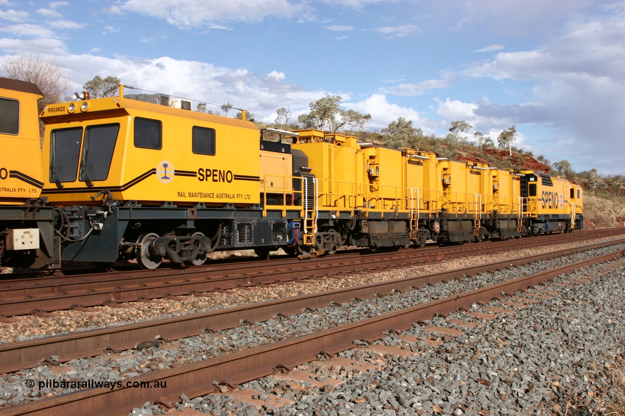 050421 1616
Hesta Siding backtrack, Speno Australia's RR24 model 24 stone rail grinder serial M20 before they had id stickers fitted, this rear unit was later stickered as RG 1. 21st April 2005.
Keywords: Speno;RR24;M20;track-machine;