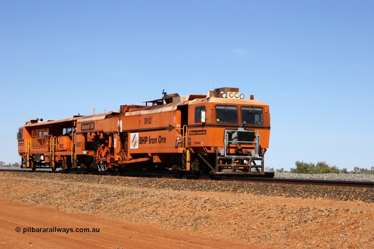 050518 2210
Bing Siding, BHP's Switch Tamper SW 02 is a Plasser Australia model Unimat S4 switch tamper runs along the passing track. 18th May 2005.
Keywords: SW02;Plasser-Australia;Unimat-4S;track-machine;