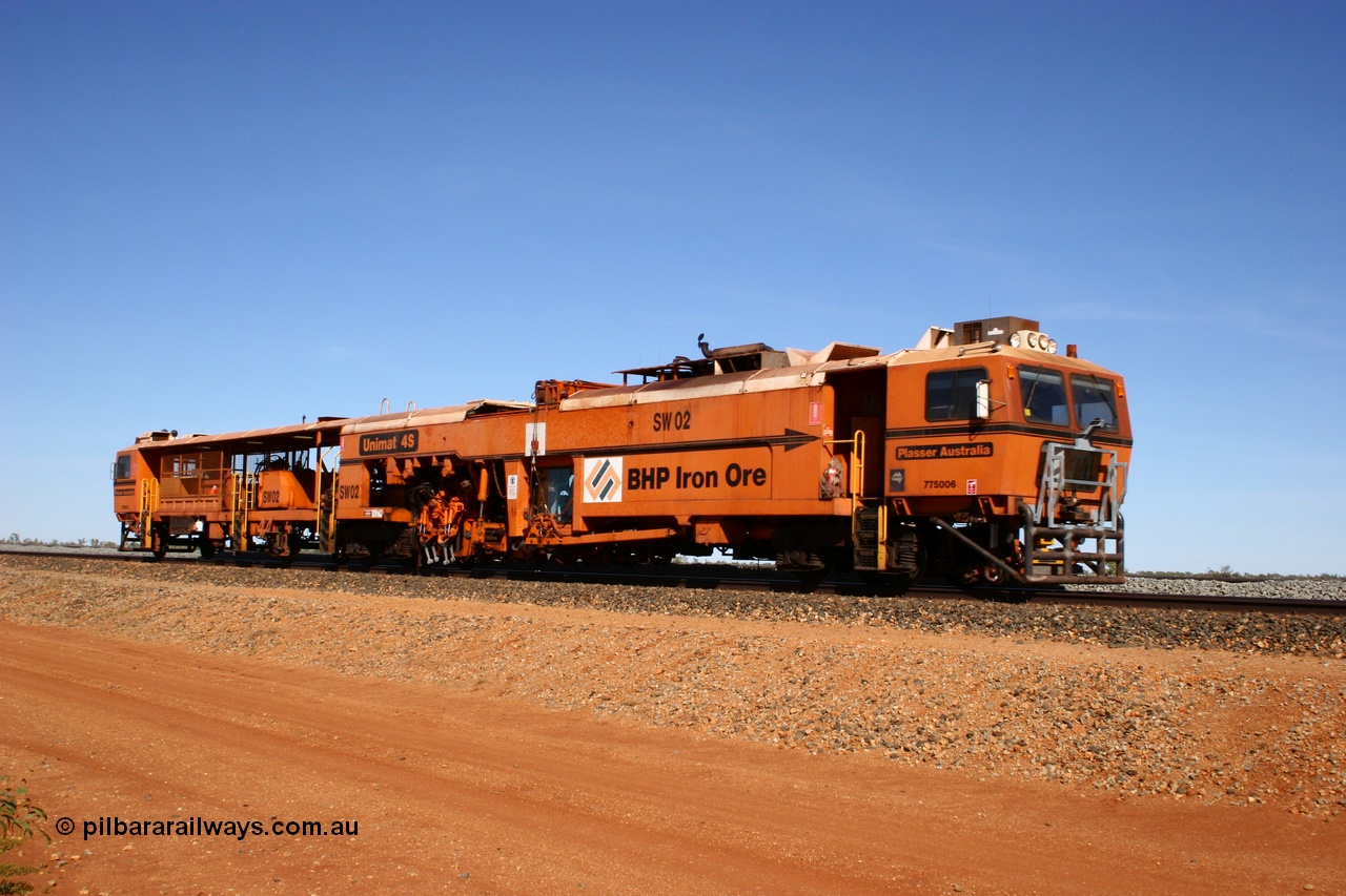 050518 2211
Bing Siding, BHP's Switch Tamper SW 02 is a Plasser Australia model Unimat S4 switch tamper runs along the passing track. 18th May 2005.
Keywords: SW02;Plasser-Australia;Unimat-4S;track-machine;
