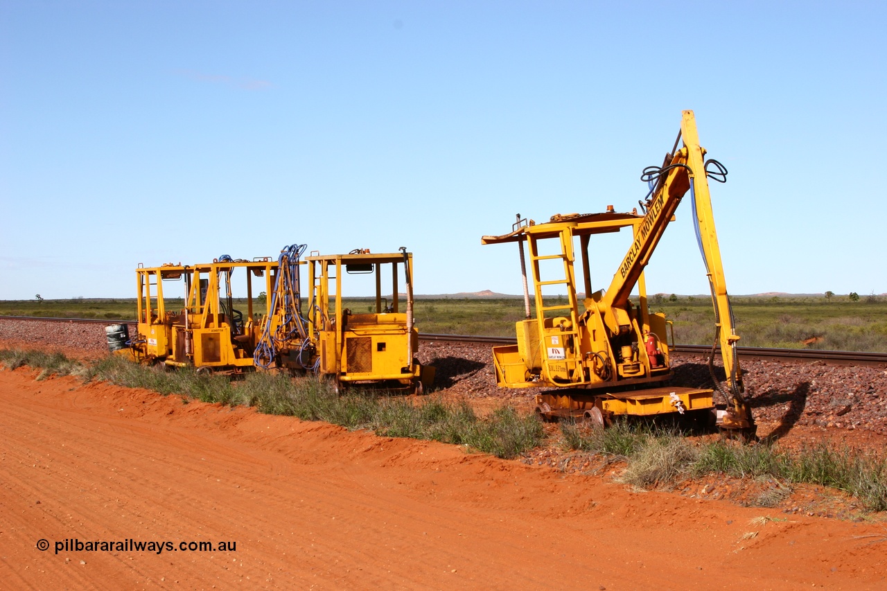 050625 3811
Node 2 at the 38 km on the GML or former Goldsworthy mainline, some Barclay Mowlem track machines are off clear of the running lines, a sleeper crane is at the front with three sleeper inserters behind. 25th June 2005.
Keywords: track-machine;