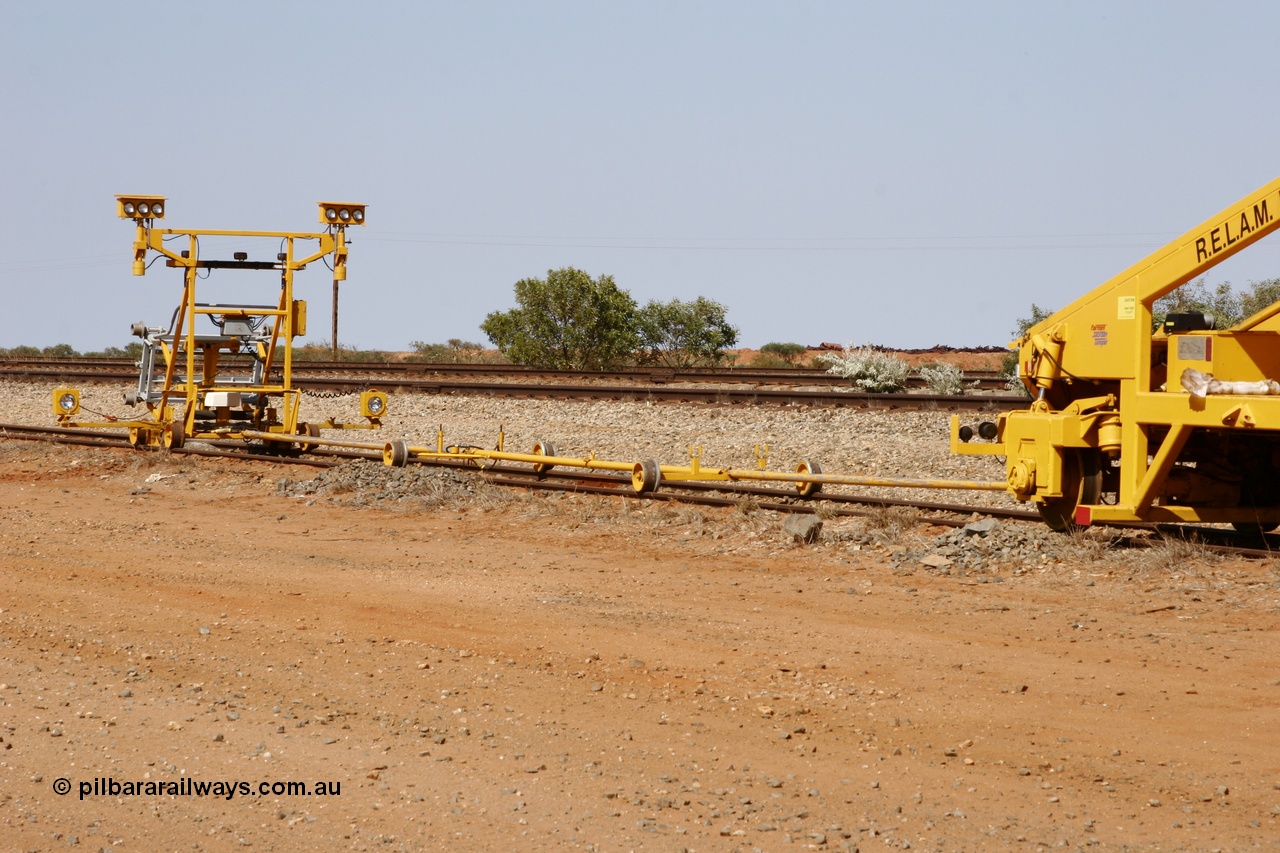 051001 5672
Flash Butt yard, Jackson model 6700 tamper serial 153246 lettered for Railway Equipment Leasing And Maintenance RELAM Inc undergoing delivery checks view of the light buggy and rods. 1st October 2005.
Keywords: Jackson;6700;153246;track-machine;