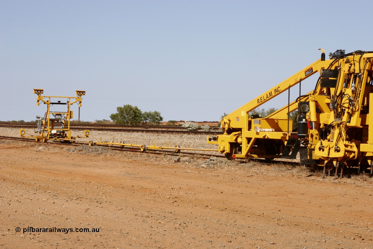 051001 5673
Flash Butt yard, Jackson model 6700 tamper serial 153246 lettered for Railway Equipment Leasing And Maintenance RELAM Inc undergoing delivery checks view of the light buggy and rods. 1st October 2005.
Keywords: Jackson;6700;153246;track-machine;