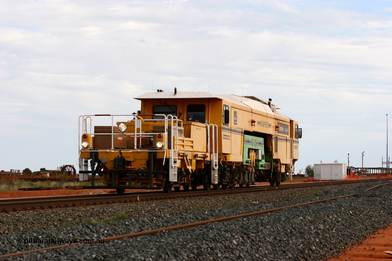 060326 3217
Goldsworthy Junction, BHP track machine Tamper 3 a Plasser Australia unit model 09-3X serial M480 runs towards Nelson Point on the mainline with the new duplicated line being constructed in the foreground. 26th March 2006.
Keywords: Tamper3;Plasser-Australia;09-3X;M480;track-machine;