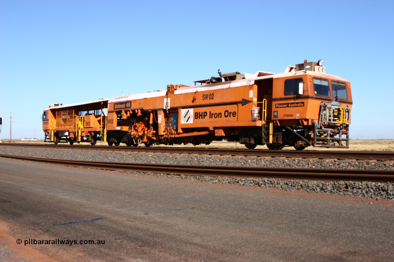 060710 6228
At the Broome Rd grade crossing Port Hedland, Switch Tamper SW 02 a Plasser Australia model Unimat S4 switch tamper. 10th July 2006.
Keywords: SW02;Plasser-Australia;Unimat-4S;track-machine;