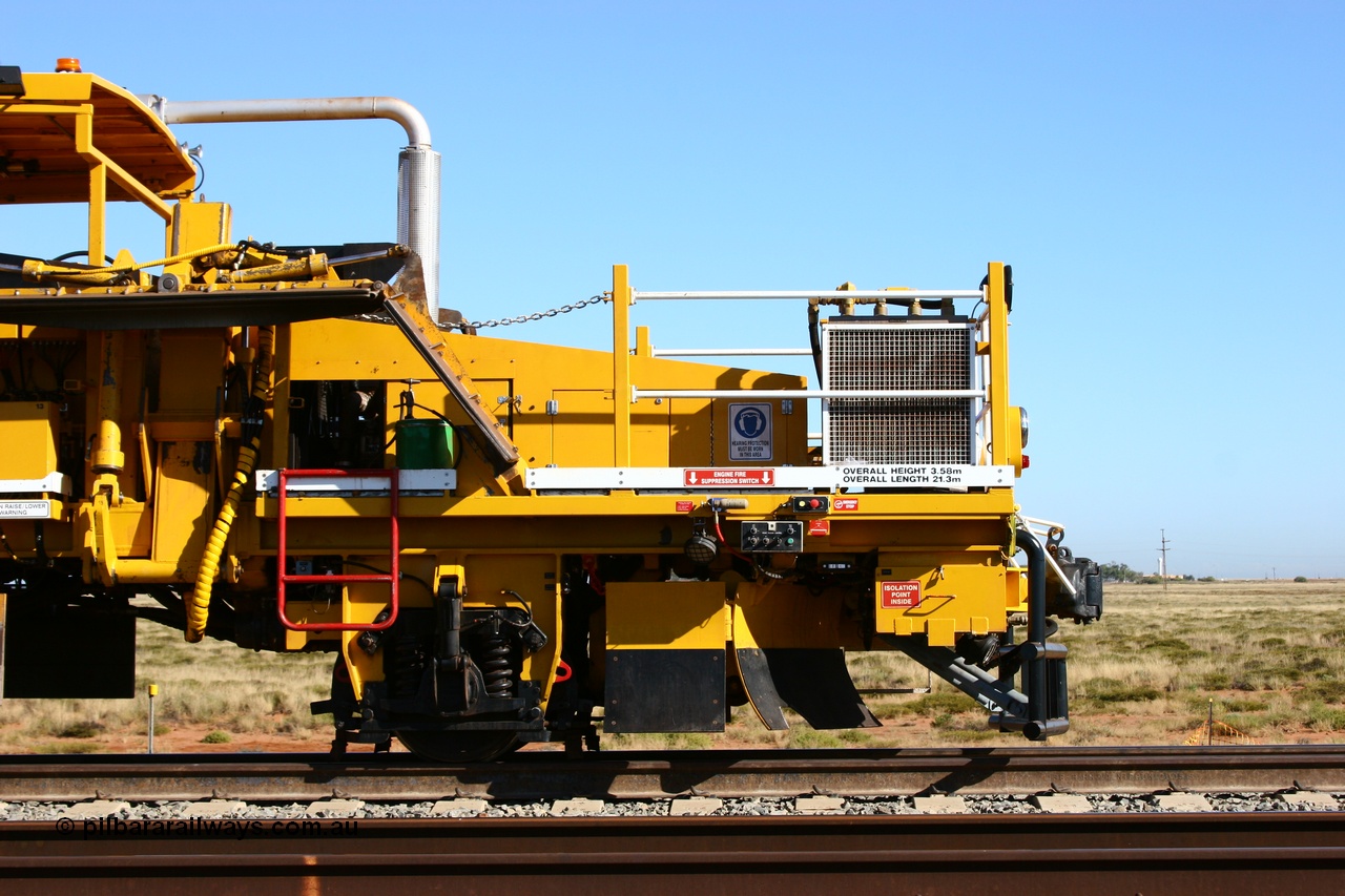 060710 6238
At the Broome Rd grade crossing Port Hedland, track machine BR 33 a Plasser Australia ballast regulator model SSP 302 serial M486. 10th July 2006.
Keywords: BR33;Plasser-Australia;SSP-302;M486;track-machine;