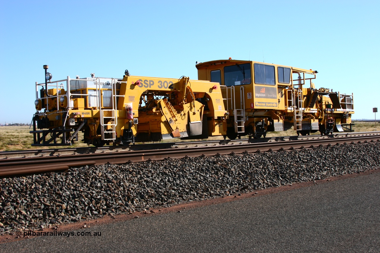 060710 6240
At the Broome Rd grade crossing Port Hedland, track machine BR 33 a Plasser Australia ballast regulator model SSP 302 serial M486. 10th July 2006.
Keywords: BR33;Plasser-Australia;SSP-302;M486;track-machine;