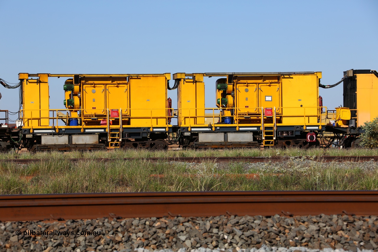 150619 9091
Flash Butt yard, Speno owned and operated rail grinder RG2 for BHP, rail grinding module, from the left, water tank, electrical cabinet, blower fans and filter housing, water tank, water tank, electrical cabinet, blower fans and filter housing, fuel tank.
Keywords: RG2;Speno;track-machine;