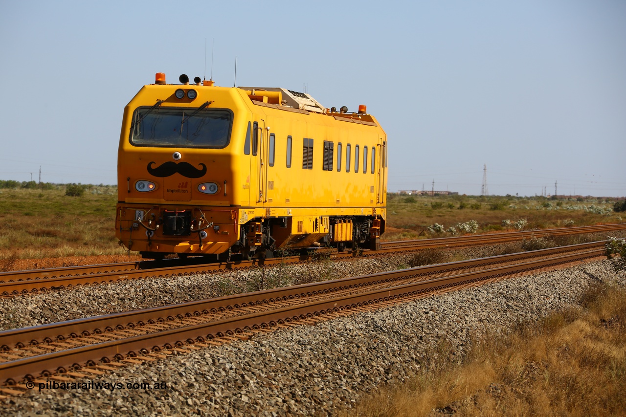 190911 4757
Port Hedland, Broome Rd crossing, BHP's MM 800 track recording vehicle powers south on a recording run, still wearing it's Movember 'mo' as part of a men's health campaign, the MM 800 was built by Mermec in Italy and is a ROGER 800 model, ROGER is an acronym for Rilievo Ottico Geometria Rotaia, Italian for optical rail geometry control.
Keywords: MM800;Mermec-Italy;Roger-800;track-machine;