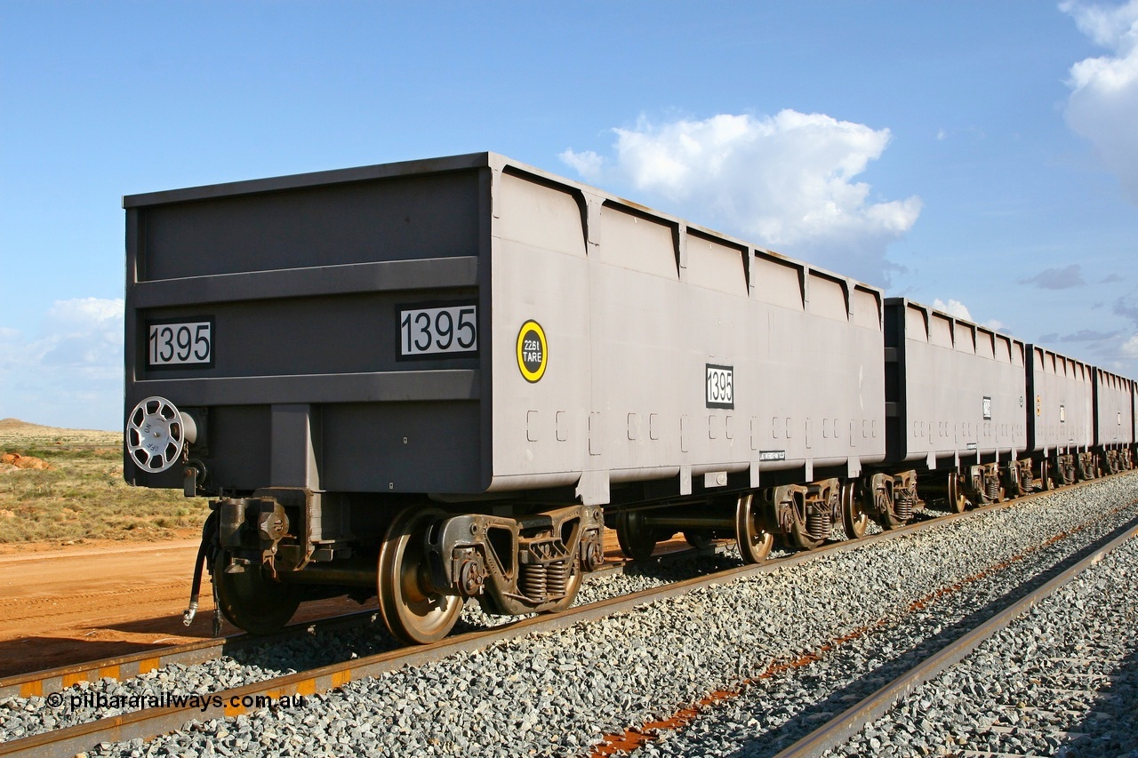 080116 1369
Chapman Siding, view from the hand brake end with F type Interlock coupling and hand brake wheel arrangement, built by China Southern or CSR at their Zhuzhou Rolling Stock Works in China in 2007. 16th January 2008.
Keywords: 1395;CSR-Zhuzhou-Rolling-Stock-Works-China;FMG-ore-waggon;