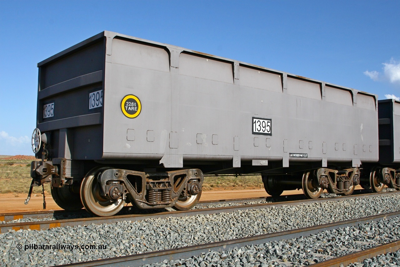 080116 1371
Chapman Siding 69 km, FMG slave waggon 1395 tare 22.6 tonnes with rotary coupler built by China Southern or CSR at their Zhuzhou Rolling Stock Works in China during 2007, stands on the passing track. 16th January 2008.
Keywords: 1395;CSR-Zhuzhou-Rolling-Stock-Works-China;FMG-ore-waggon;