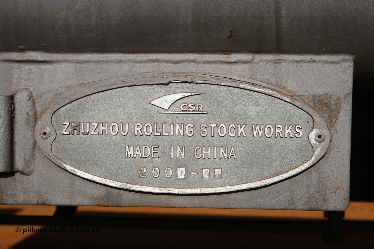 080116 1378
Chapman Siding, FMG slave waggon 1187, built by CSR at their Zhuzhou Rolling Stock Works in China during August 2007, view of the builders plate. 16th January 2008.
Keywords: 1187;CSR-Zhuzhou-Rolling-Stock-Works-China;FMG-ore-waggon;