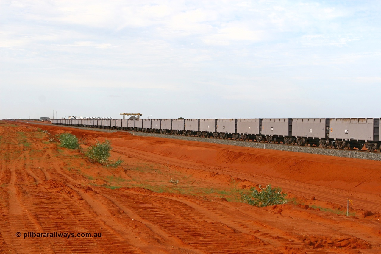 080304 2170
Thomas Yard, down the rail welding end, rake of waggons built by China Southern or CSR at their Zhuzhou Rolling Stock Works in China in 2007 with the welding yard behind them. 4th March 2008.
Keywords: CSR-Zhuzhou-Rolling-Stock-Works-China;FMG-ore-waggon;