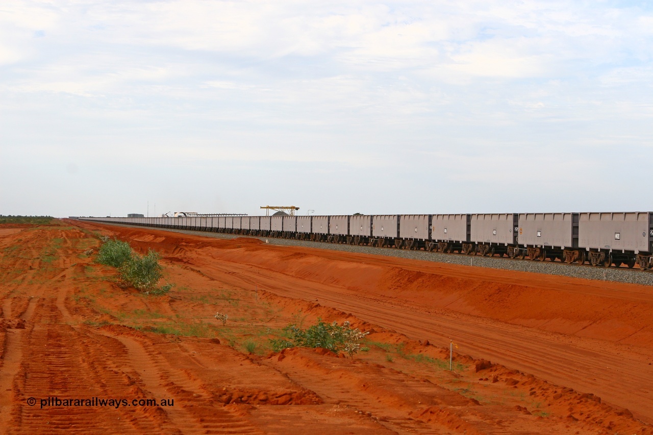 080304 2193
Thomas Yard, looking north, long rake of waggons being run up and down the mainline to keep the wheels turning. 4th March 2008.
Keywords: FMG-ore-waggon;